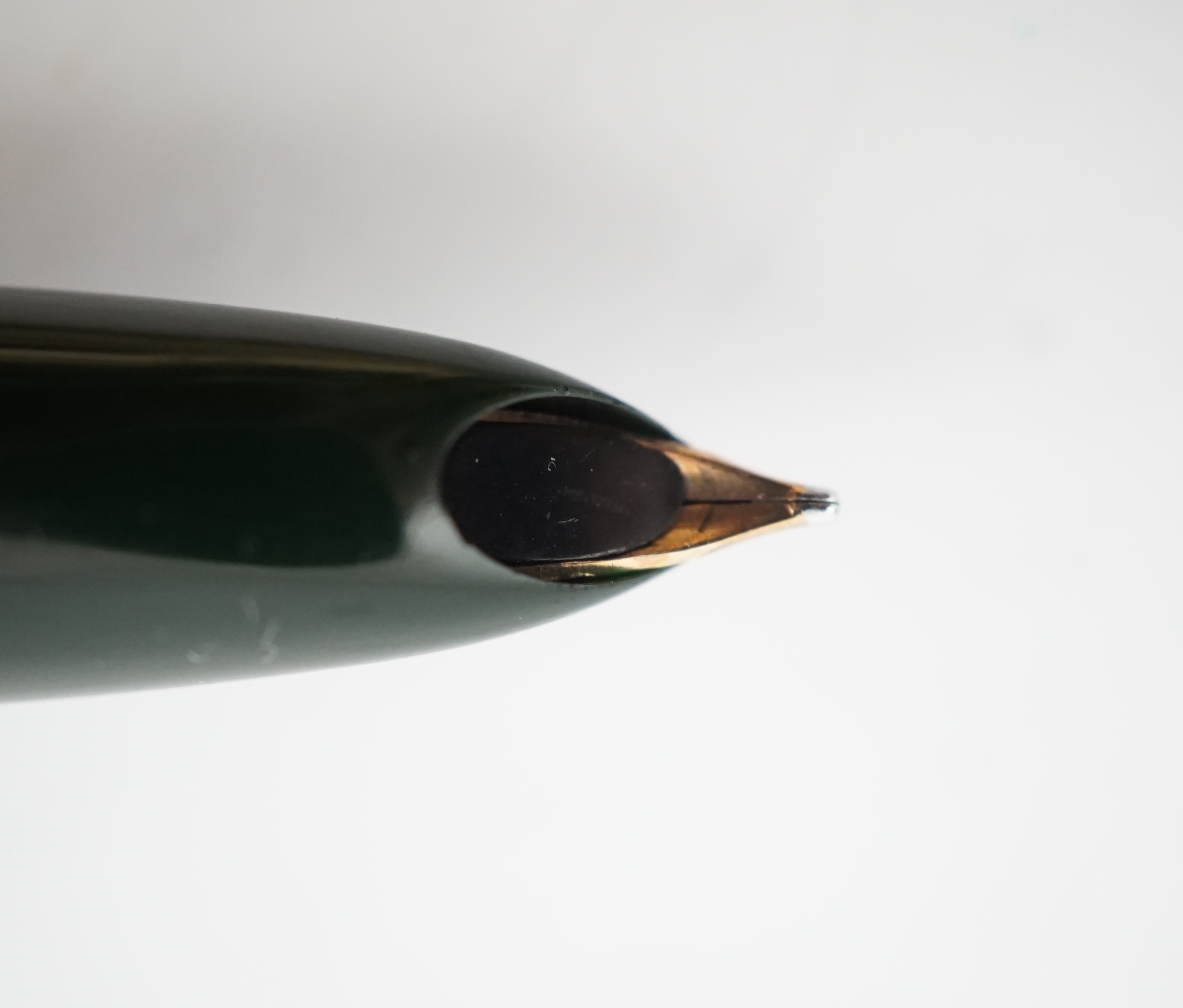 A Parker '51' Aerometric fountain pen, ball pen and pencil set in rare 'Forest Green'